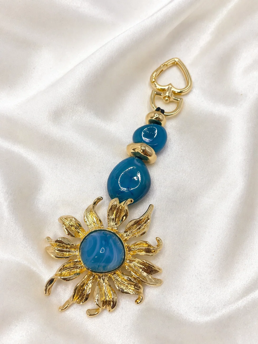 Chaveiro Sol Resinada Dourado