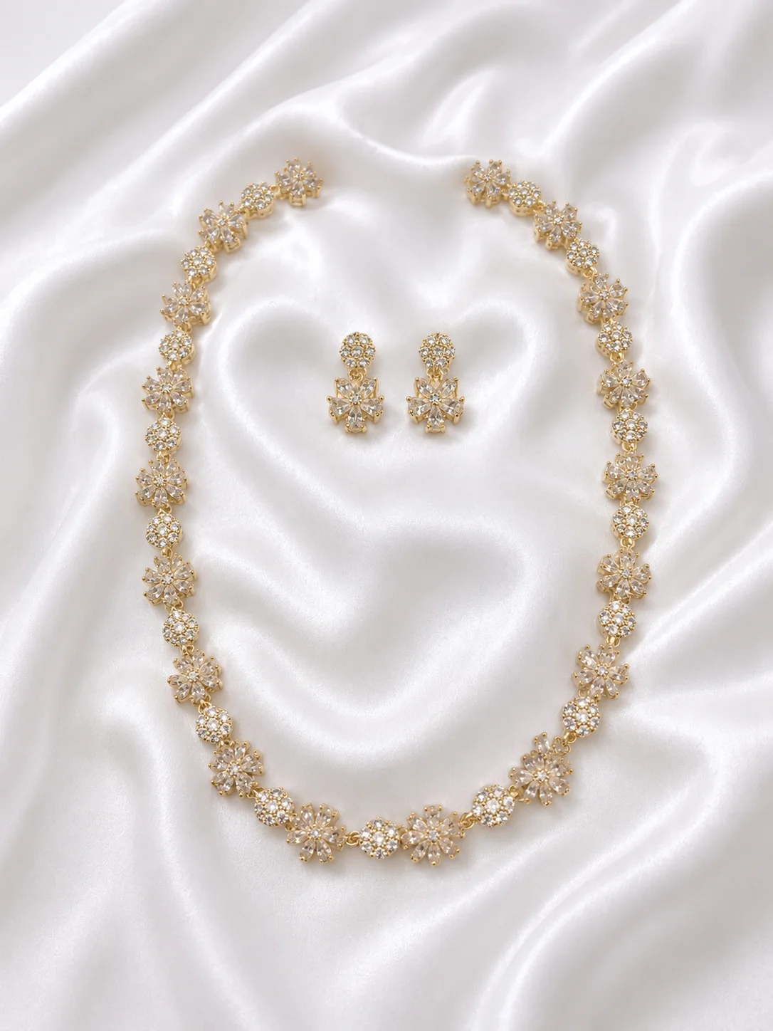 Conjunto Flor Gold Cravejado 